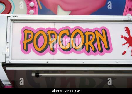 Popcorn Sign on carnival refreshment stand Stock Photo