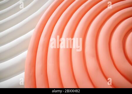 A pink and white abstract ripples wave background Stock Photo