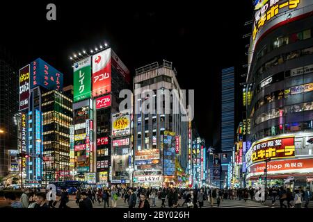 Tokyo Japan October 29th 2016 : Shops, restaurants and aprtments illuminated at night in Tokyo's Shinjuku district Stock Photo