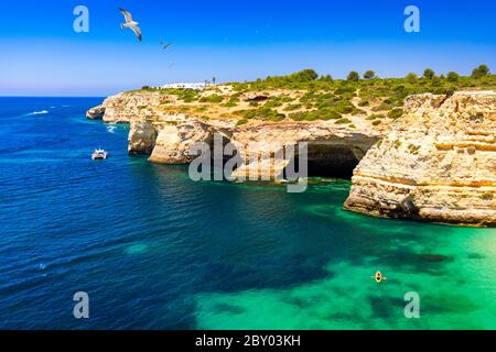 Corredoura Beach, sighted viewpoint on the trail of the Seven Suspended Valleys (Sete Vales Suspensos). Praia da Corredoura with flying seagulls near Stock Photo
