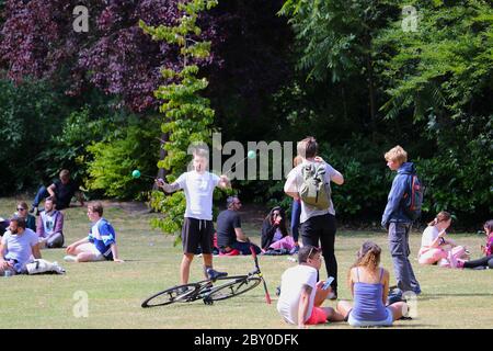 Dublin. 9th June, 2020. People enjoy outdoor life at a public park in Dublin, Ireland, June 8, 2020. More businesses and public amenities in Ireland reopened on Monday as the country entered the first day of what the government called Phase 2 in reopening society and business. Credit: Xinhua/Alamy Live News Stock Photo