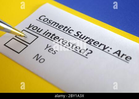 One person is answering question about cosmetic surgery. Stock Photo