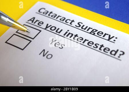One person is answering question about cataract surgery. Stock Photo