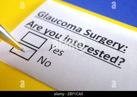 One person is answering question about glaucoma surgery. Stock Photo