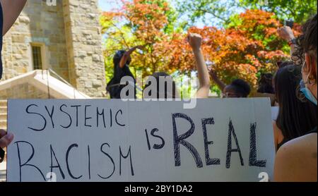 Black Lives Matter Protest George Floyd - Systemic Racism Is Real Sign lead by young black female - ridgefield park, bergen county, new jersey, usa mo Stock Photo
