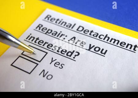 One person is answering question about retinal detachment repair. Stock Photo