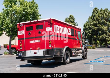 May 21, 2020 Sunnyvale / CA / USA - Brinks armored truck safely transporting cash; The Brink's Company is an American private security and protection Stock Photo