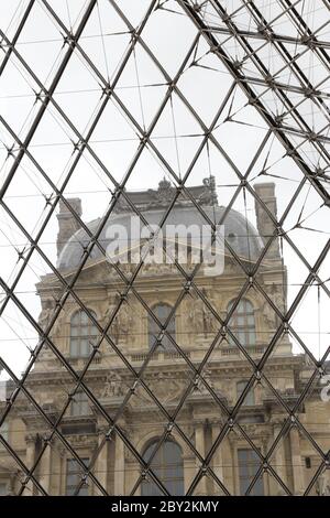 Paris, France - May 18, 2019: View of the Louvre Museum from the underground lobby of the Pyramid Stock Photo