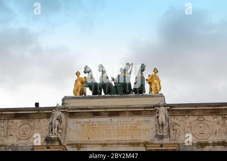 Paris, France - May 18, 2019: Arc de Triumph du Carousel is a triumphal arch in the courtyard of Louvre museum Stock Photo