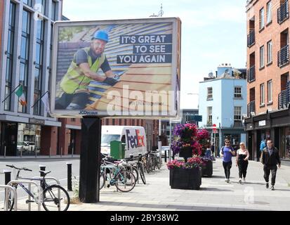 Dublin. 9th June, 2020. People walk along a street in Dublin, Ireland, June 8, 2020. More businesses and public amenities in Ireland reopened on Monday as the country entered the first day of what the government called Phase 2 in reopening society and business. Credit: Xinhua/Alamy Live News Stock Photo