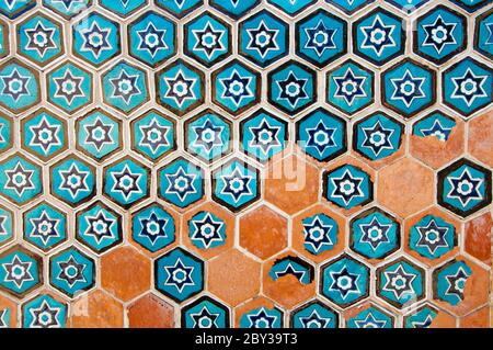 Colorful vintage geometrical blue ceramic tiles pattern with david star decoration on the wall background Stock Photo