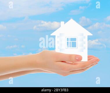 house in human hands Stock Photo
