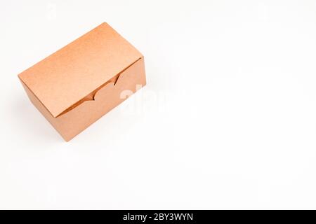 Paper box for food on a light background. Eco packaging for food storage and delivery. Stock Photo
