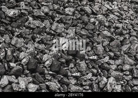 Texture coal. Natural black coals for background. Industrial coal. Coal mining. Shot CloseUp of black anthracite for background Stock Photo