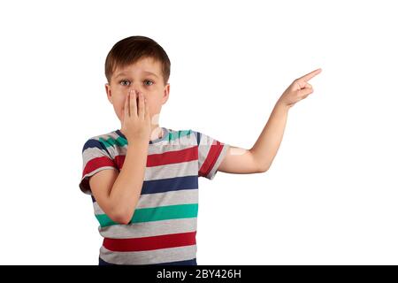 Cute kid pointing with his finger on something, isolated on white background. Stock Photo