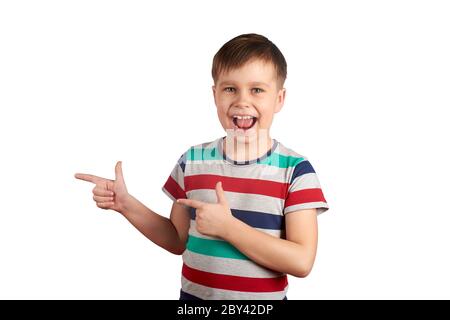 Cute kid pointing with his finger on something, isolated on white background. Stock Photo