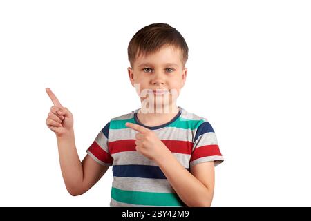 Cute kid pointing with his finger on something, isolated on white background. Stock Photo