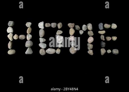 Home text on black color background with copy space using with stones Stock Photo