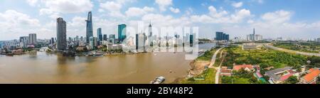HO CHI MINH, VIETNAM - June 8, 2020 : Aerial view of Bitexco Financial Tower building, train tracks, buildings, roads, and Saigon river in Ho Chi M Stock Photo