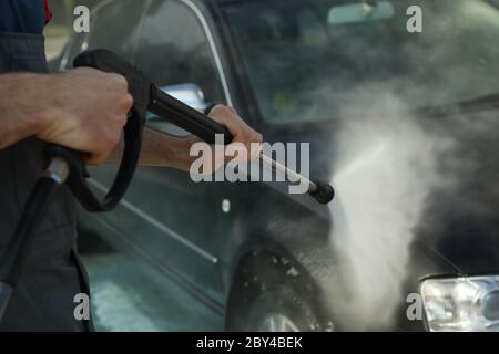 A man washes a car. Clear car concept Stock Photo