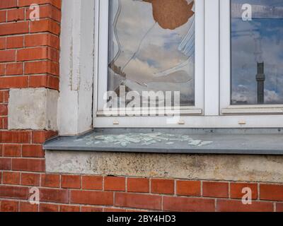 Broken window vandalism image background Stock Photo