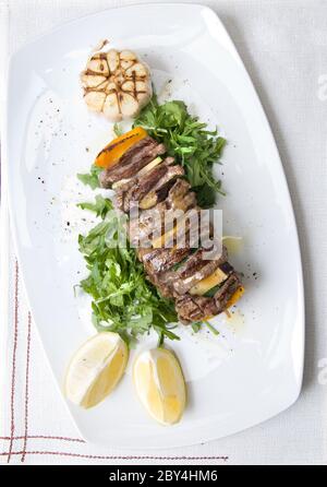 shashlik with potherbs on the plate shashlik with potherbs on the plate Stock Photo