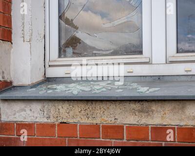 Broken window after a break-in Stock Photo