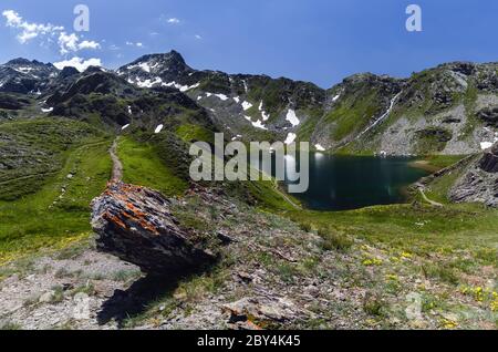 The Lac Bleu in Chianale, mountain lake in the italian alps of Cuneo, Piedmont. Stock Photo
