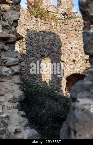 A rock wall against a blue sky. Stock Photo