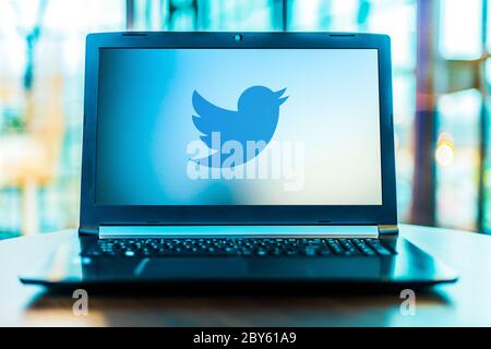 POZNAN, POL - MAR 24, 2020: Laptop computer displaying logo of Twitter, an American online microblogging and social networking service Stock Photo
