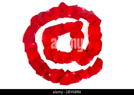 e-mail symbol  made from red petals rose on white Stock Photo