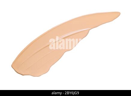 Face foundation sample isolated on white. Cream makeup texture. Stock Photo