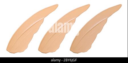 Face foundation samples isolated on white. Natural colors cosmetic products brush strokes swatches. Stock Photo