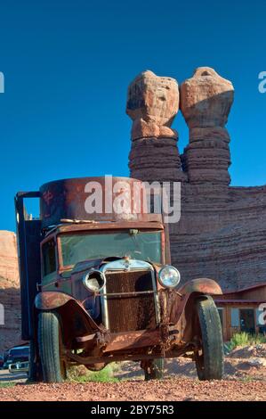 Rusted 1930's Chevy truck at Twin Rocks Trading Post cafe in Bluff, Utah, USA Stock Photo