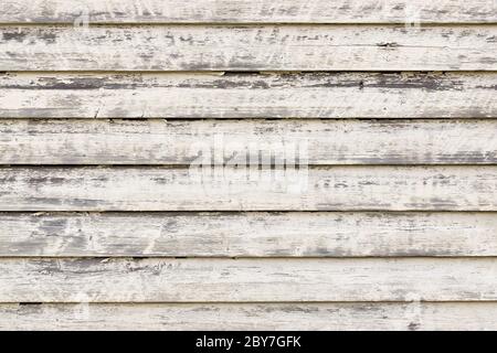White painted rustic wood planks background with flaking paint. Stavanger, Norway. Stock Photo