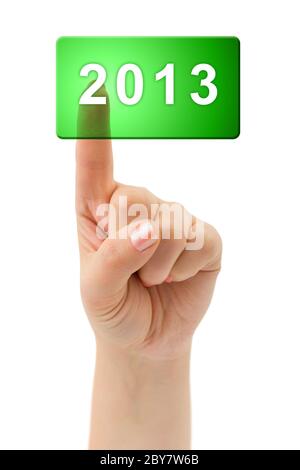 Hand and button 2013 Stock Photo