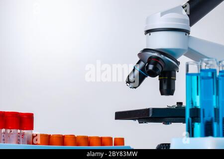 Microscope with test tubes for research close up Stock Photo