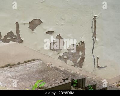 Plaster falls off a wall Stock Photo