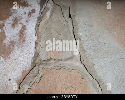 Cracked building defects in a wall Stock Photo