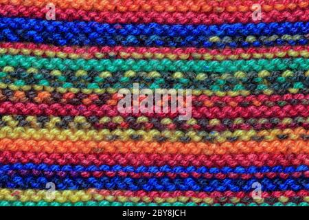 Horizontal multi coloured close up knitted wool pattern Stock Photo
