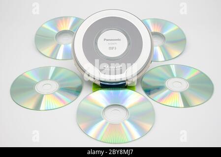 Angri, Italy. June 4th, 2020. Old Panasonic portable cd and Mp3 player with several cds, taken over on white backdrop. Stock Photo