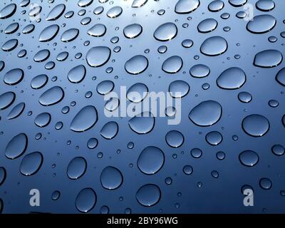 Water drops through the window after the rain. Stock Photo