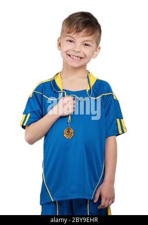 Boy in ukrainian national soccer uniform Stock Photo
