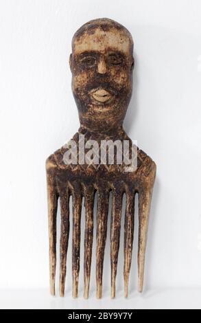 Hand Carved African Wooden Comb Stock Photo