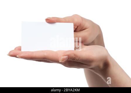 Woman hand holding empty visiting card isolated on white Stock Photo