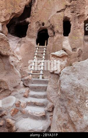 NM00617-00...NEW MEXICO - Cliff dwellings, talus houses, along the Main Loop Trail in Bandelier National Monument. Stock Photo