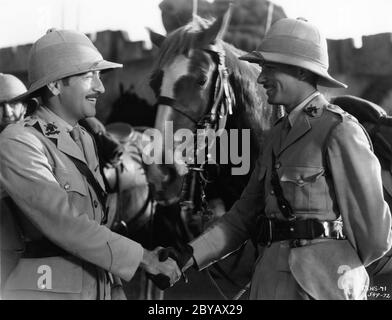 ADOLPHE MENJOU and LAURENCE OLIVIER in FRIENDS AND LOVERS 1931 director VICTOR SCHERTZINGER novel Maurice Dekobra RKO Radio Pictures Stock Photo