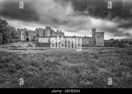 Southern gate, curtain wall and Record Tower, Alnwick Castle, Northumberland Stock Photo