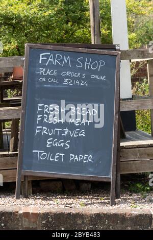 A pop-up farm shop in the Crown Inn pub while it is closed during the 2020 coronavirus covid-19 pandemic, Old Basing village, Hampshire, UK Stock Photo