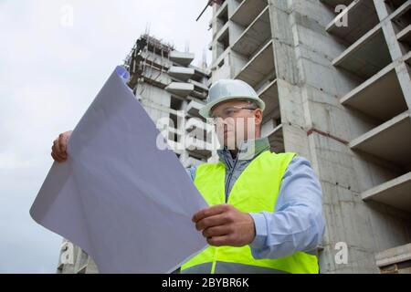 Engineer Working on Building Site Stock Photo